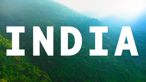 Aerial-Drone-Shot-Of-Forests-And-Mountains-In-India-With-Animated-Graphic-Spelling-Out-India